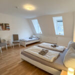 2.Schlafzimmer mit 3 Betten in der Wohnung Stadtpark